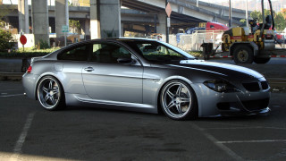 Silver car parking lot construction - a silver car free wallpaper for desktop