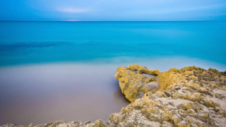 Rock water beach blue sky - a blue ocean free wallpaper