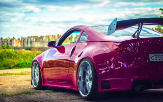 Pink sports car dirt road - a hood free wallpaper for desktop