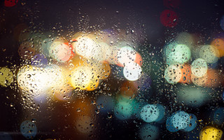 Blurry city street rain water - a microscopic photo free wallpaper