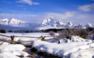 Snowy mountain range wooden fence - a wooden fence free wallpaper
