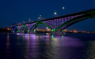 Lit bridge night water cityscape - vivid color free wallpaper