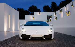 White sports car night building 4 - a white building free wallpaper