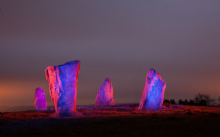Glowing rocks night field abstract - ambient light free wallpaper