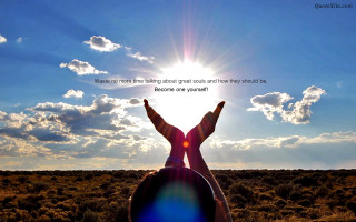 Person sitting field hands up - shining free wallpaper