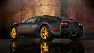 Black gold sports car garage - reflective free wallpaper