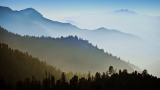 Mountain range forest lake fog - a few cloud free wallpaper for desktop