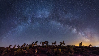 Night sky stars milky way 2 - a group of people riding free wallpaper
