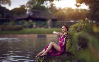 Woman pink dress lake fishing - a fishing rod free wallpaper