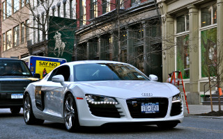 White car black truck cityscape - photorealism free wallpaper for desktop