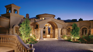 Large house clock tower night - a large house free wallpaper