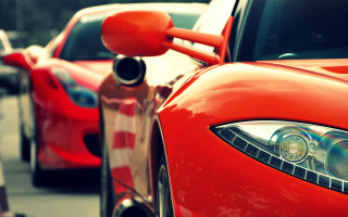 Red sports car headlight bokeh - a red sports car free wallpaper
