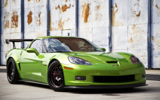 Green sports car rusty wall - a green sports car free wallpaper for desktop
