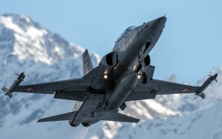 Fighter jet snow mountains daylights - free bird wallpaper