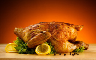 Roasted chicken lemons greens wooden - a black dot free wallpaper