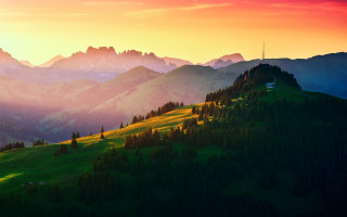 Mountain range sunset house cross - the top of it free wallpaper