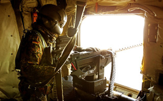 Man military machine room window - a man in a military uniform free wallpaper