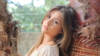 Woman leaning tree closed eyes - a woman leaning against a tree free wallpaper