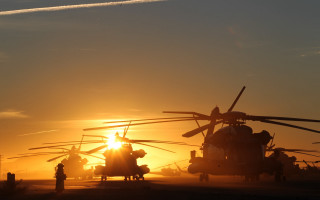 Military helicopters sunset skyline backlit - donald sherwood free wallpaper