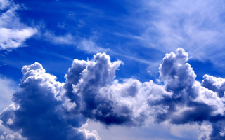 Plane clouds blue sky mountains - free sky wallpaper