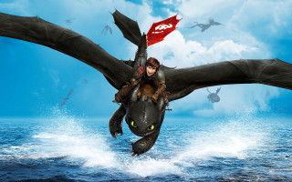 Dragon riding boy over ocean - a young boy free wallpaper