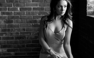 Aramenta dianthe vail blackwhite portrait - her hand and a brick wall behind her free wallpaper