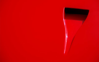 Red wall black handle white - a black handle free wallpaper