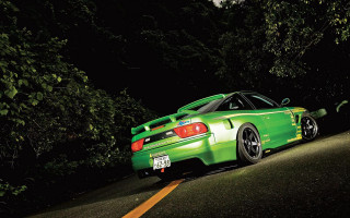 Green car night astronaut fireworks - a license plate free wallpaper for desktop