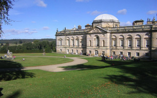 Large building circular walkway dome - a grassy area free wallpaper