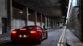 Red sports car tunnel building - a red sports car free wallpaper