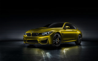 Yellow bmw car dark room - a white wall behind free wallpaper