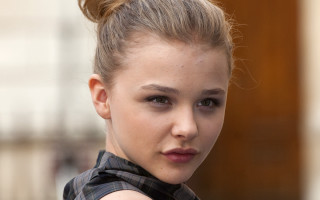 Woman messy topknot ponylook serious - messy free wallpaper