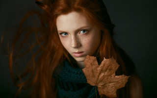 Red haired woman leaf serious - a young woman free wallpaper
