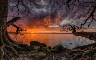 Sunset lake trees rocks mystical - a sunset over a lake free wallpaper