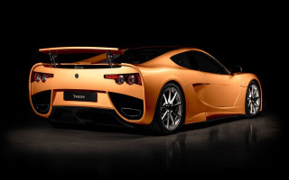 Orange sports car dark room 9 - nice looking orange sports car free wallpaper
