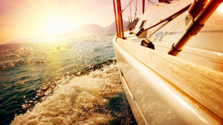 Boat sunset ocean mountains photorealism - the water and mountains free wallpaper