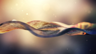 Colorful light wave blurry background - a colorful wave of light free wallpaper