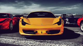 Yellow ferrari red ferrari parking - overhead in the background free wallpaper