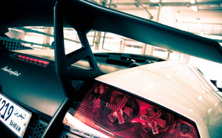 White car red taillight garage - a red tail light free wallpaper