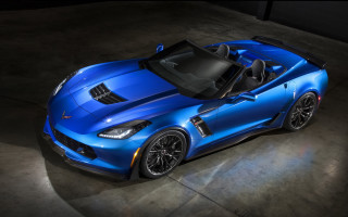 Blue sports car top view - a spotlight free wallpaper