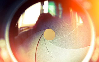 Camera lens microscopic blurry background - a yellow circle free wallpaper