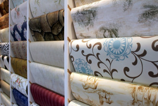 Colored fabric wall storefront display - a store free wallpaper