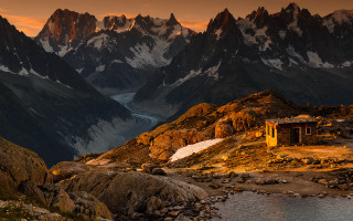 Rocky hut lake mountains dusk - a rocky mountain free wallpaper