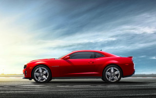 Red sports car runway cloudy 3 - a runway under a cloudy sky free wallpaper
