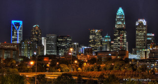 City skyline night tall buildings 23 - charles williams free wallpaper