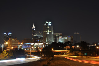 City skyline night lights freeway - a few light free wallpaper