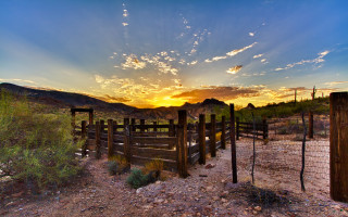 Desert fence sunset mountains clouds - a few cloud free wallpaper for desktop
