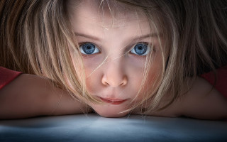 Young girl blue eyes serious 2 - caroline lucy scott free wallpaper