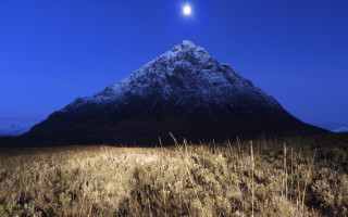 Snowy mountain full moon grassy - a moon in the sky above free wallpaper