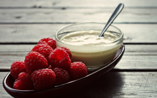 Yogurt raspberries wooden table food - a plate free wallpaper